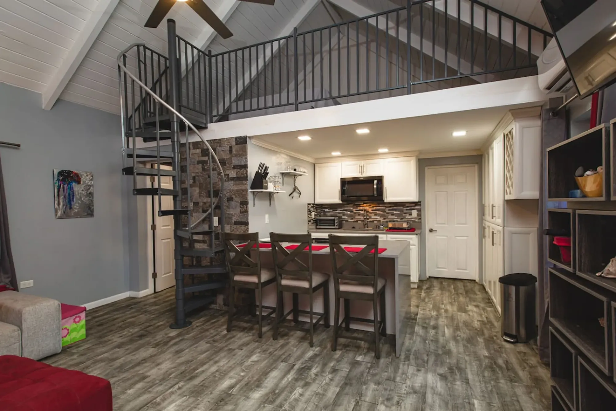 The separate guest cottage has its own kitchen, living room and bedroom.