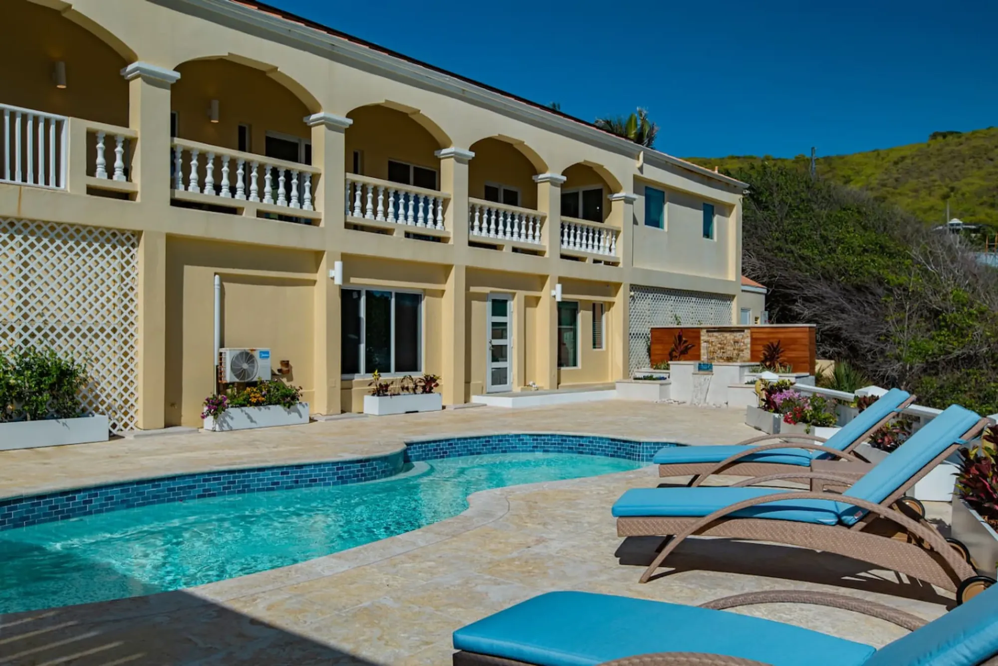 The Cerulean villa and pool above the sea