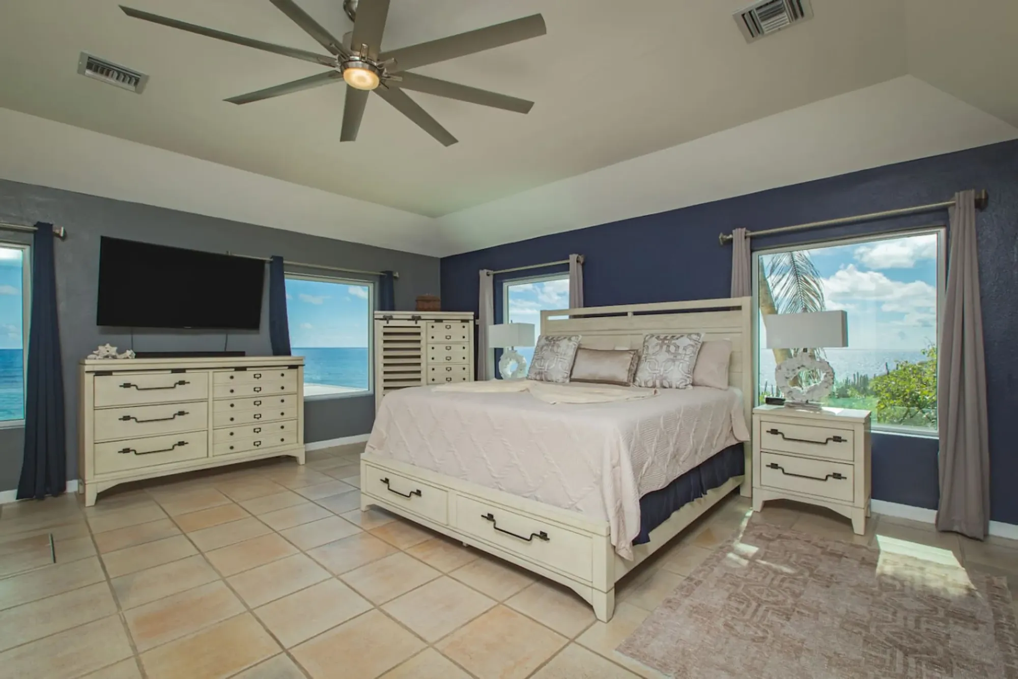 A bedroom opening toward the sea