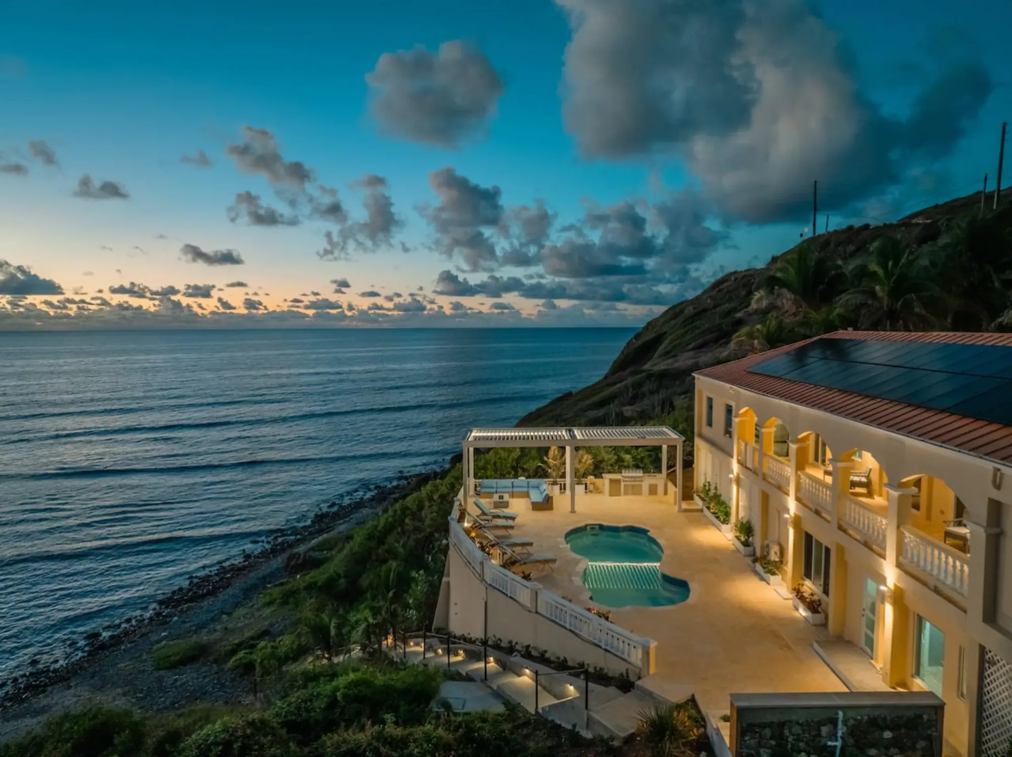 The Cerulean villa at dawn above the sea