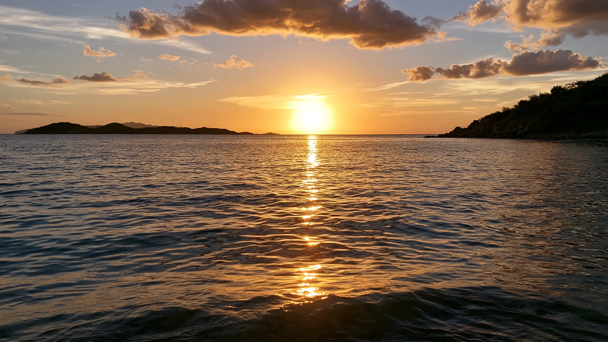 Sunset over the calm Caribbean Sea