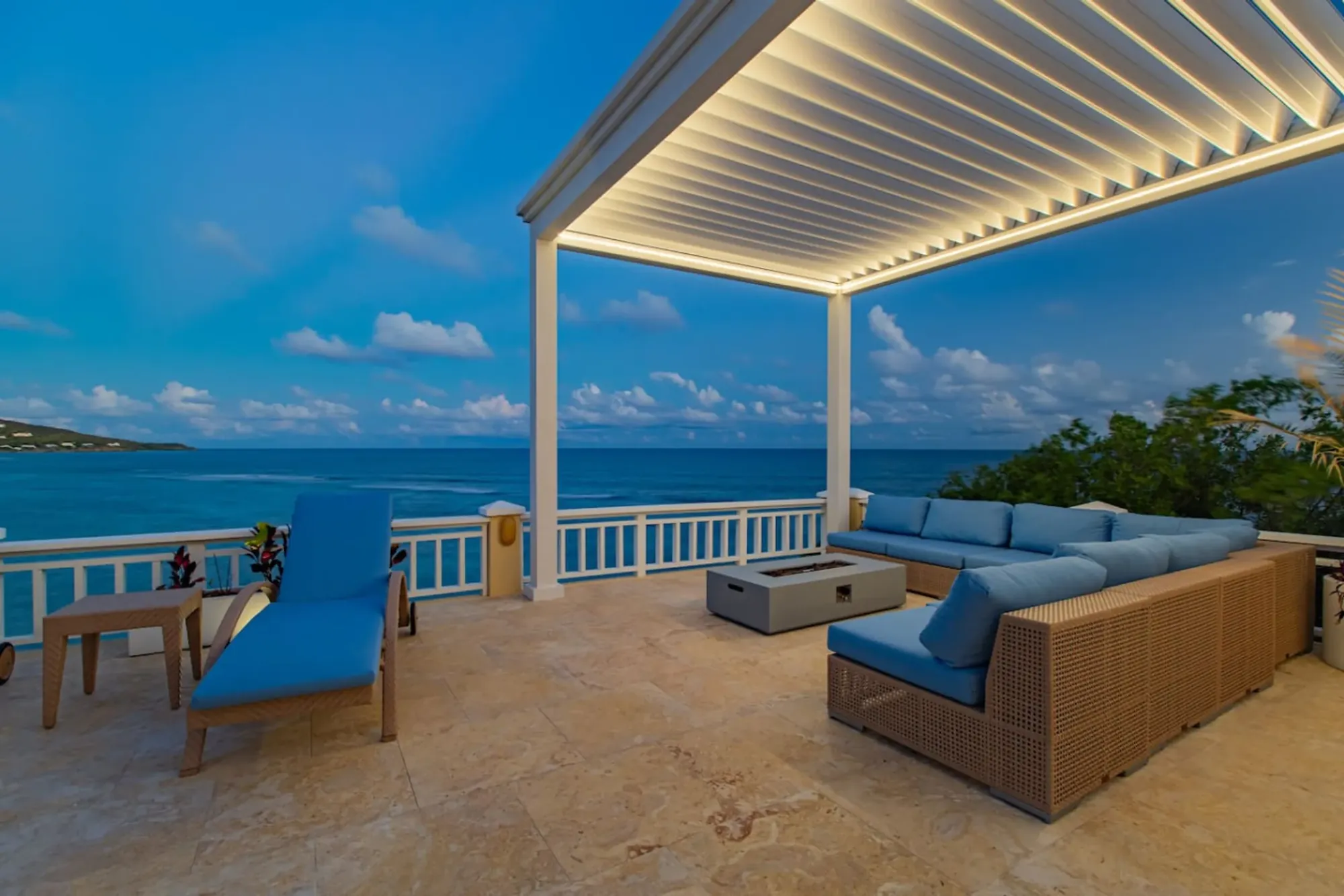 Covered terrace lounge overlooking the sea